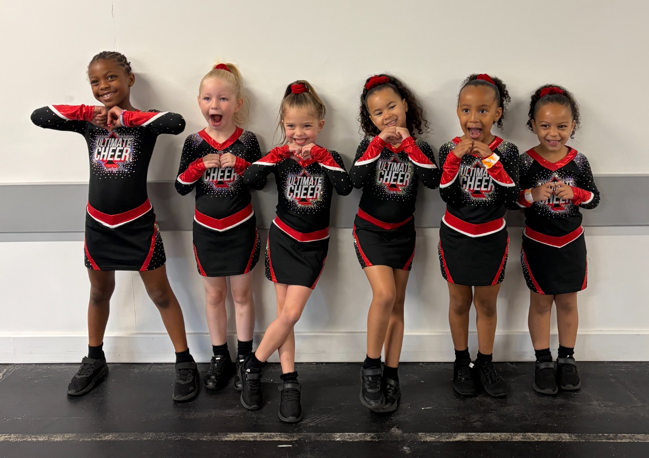 Young athletes enjoying Kids Cheer classes at Ultimate Cheer